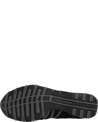 schwarze Turnschuhe von Skechers