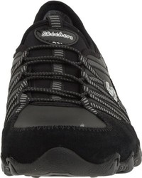 schwarze Turnschuhe von Skechers