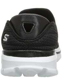 schwarze Turnschuhe von Skechers