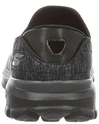 schwarze Turnschuhe von Skechers