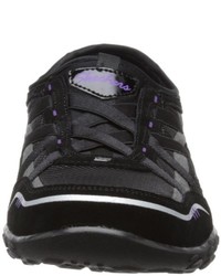 schwarze Turnschuhe von Skechers