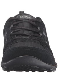 schwarze Turnschuhe von Skechers