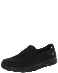 schwarze Turnschuhe von Skechers