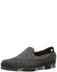 schwarze Turnschuhe von Skechers