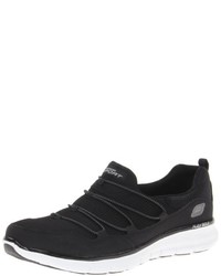 schwarze Turnschuhe von Skechers