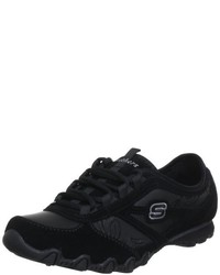 schwarze Turnschuhe von Skechers