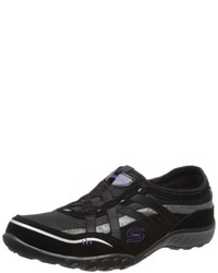 schwarze Turnschuhe von Skechers