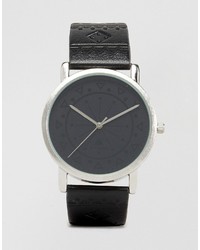 schwarze Uhr mit geometrischem Muster