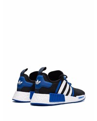 schwarze und blaue Sportschuhe von adidas