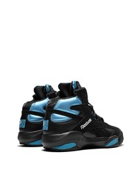 schwarze und blaue Sportschuhe von Reebok