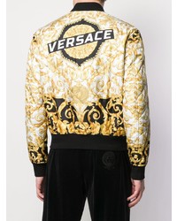 schwarze und goldene bedruckte Bomberjacke von Versace