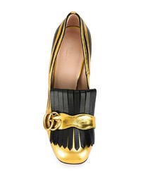schwarze und goldene Leder Pumps von Gucci