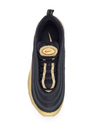schwarze und goldene niedrige Sneakers von Nike