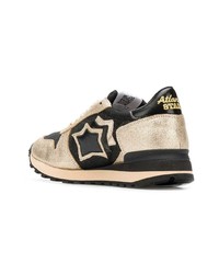 schwarze und goldene niedrige Sneakers von atlantic stars