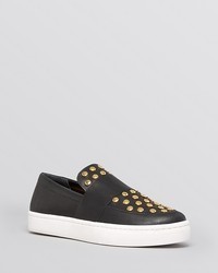 schwarze und goldene Slip-On Sneakers