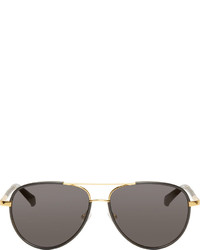 schwarze und goldene Sonnenbrille von The Row