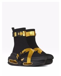 schwarze und goldene Sportschuhe von Balmain