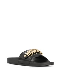 schwarze und goldene verzierte Ledersandalen von Moschino