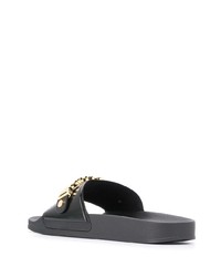 schwarze und goldene verzierte Ledersandalen von Moschino