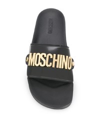 schwarze und goldene verzierte Ledersandalen von Moschino