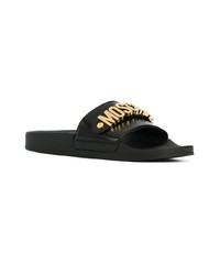 schwarze und goldene verzierte Ledersandalen von Moschino