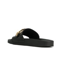 schwarze und goldene verzierte Ledersandalen von Moschino