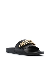 schwarze und goldene verzierte Ledersandalen von Moschino