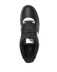 schwarze und silberne Leder niedrige Sneakers von Nike