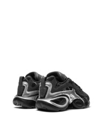 schwarze und silberne Sportschuhe von Reebok