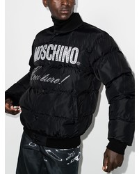 schwarze und weiße bedruckte Daunenjacke von Moschino