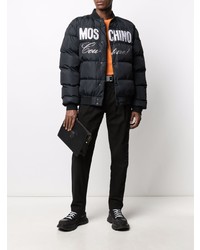 schwarze und weiße bedruckte Daunenjacke von Moschino