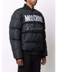 schwarze und weiße bedruckte Daunenjacke von Moschino