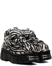 schwarze und weiße bedruckte Gummi hohe Sneakers von Vetements