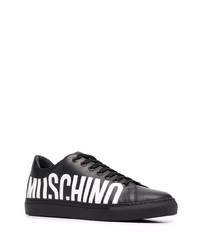 schwarze und weiße bedruckte Leder niedrige Sneakers von Moschino