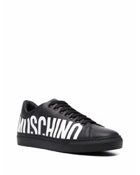 schwarze und weiße bedruckte Leder niedrige Sneakers von Moschino