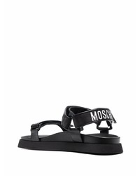 schwarze und weiße bedruckte Ledersandalen von Moschino