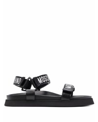 schwarze und weiße bedruckte Ledersandalen von Moschino
