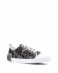 schwarze und weiße bedruckte Segeltuch niedrige Sneakers von Moschino