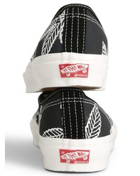 schwarze und weiße bedruckte Segeltuch niedrige Sneakers von Vans