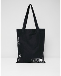 schwarze und weiße bedruckte Shopper Tasche aus Segeltuch von ASOS DESIGN