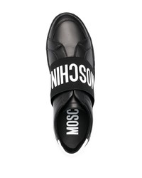 schwarze und weiße bedruckte Slip-On Sneakers aus Leder von Moschino