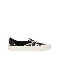 schwarze und weiße bedruckte Slip-On Sneakers aus Segeltuch