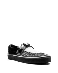 schwarze und weiße bedruckte Slip-On Sneakers aus Segeltuch von Vans