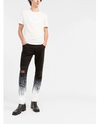schwarze und weiße enge Jeans mit Destroyed-Effekten von Dolce & Gabbana