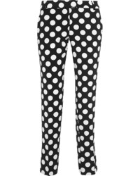 schwarze und weiße gepunktete enge Hose von Moschino