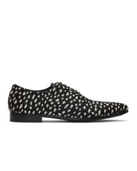 schwarze und weiße gepunktete Segeltuch Oxford Schuhe