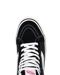 schwarze und weiße hohe Sneakers aus Segeltuch von Vans