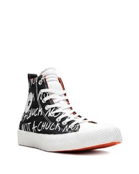 schwarze und weiße hohe Sneakers aus Segeltuch von Converse