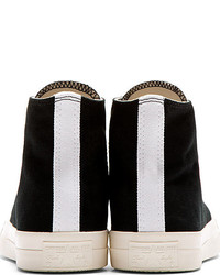 schwarze und weiße hohe Sneakers von Comme des Garcons