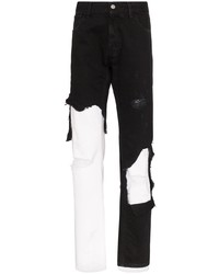 schwarze und weiße Jeans mit Destroyed-Effekten von Raf Simons